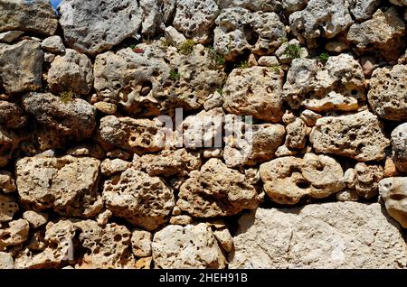 Textured wall of Neolithic megalith temple complex of Ggantija, Gozo island, Malt Stock Photo