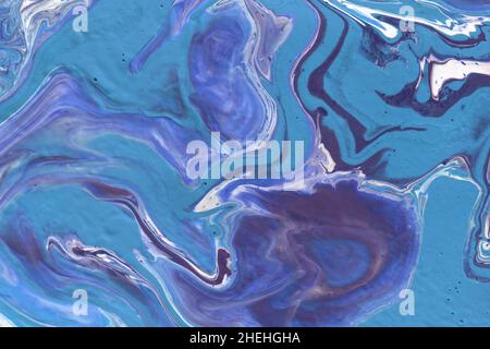 Monochrome acrylic texture made in liquid pour technique. Background in blue colors. Stock Photo