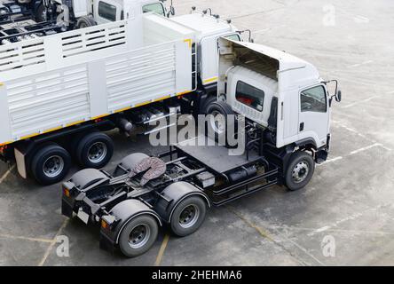 Heads of white semi trailer trucks Stock Photo