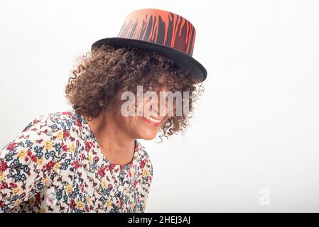 Close-up portrait of smiling Brazilian mature woman, wearing cap Stock Photo