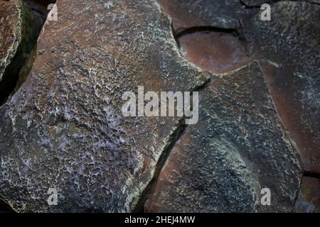 the texture of the stone is brown with large cracks Stock Photo