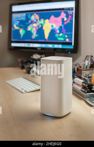 HUAWEI 5G Router and wi-fi enabled hub in a domestic setting with old ...
