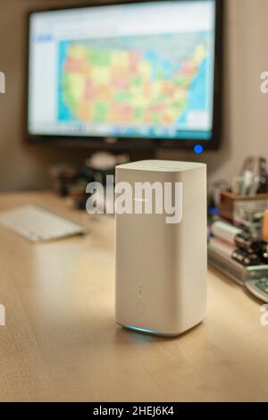 HUAWEI 5G Router and wi-fi enabled hub in a domestic setting with old ...