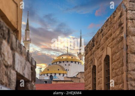 Amazing sunset view of the beautiful King Hussein Mosque in Madaba, Jordan Stock Photo