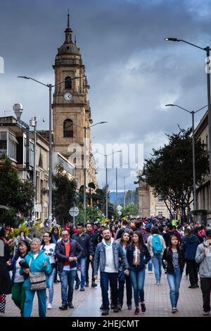 South America, Colombia, Bogota. Local people in Bolivar Square downtown with the cathedral basilica in the background Stock Photo