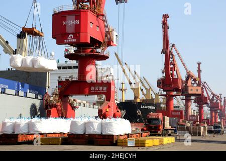 LIANYUNGANG, CHINA - JANUARY 11, 2022 - A view of cargo loading and unloading at the Port of Lianyungang, Lianyungang City, Jiangsu Province, China, J Stock Photo