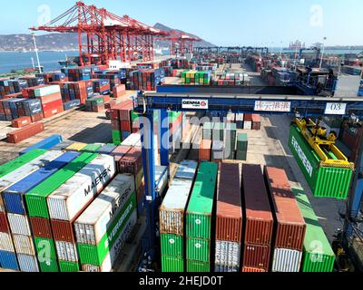 LIANYUNGANG, CHINA - JANUARY 11, 2022 - A view of cargo loading and unloading at the Port of Lianyungang, Lianyungang City, Jiangsu Province, China, J Stock Photo