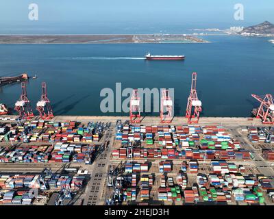 LIANYUNGANG, CHINA - JANUARY 11, 2022 - A view of cargo loading and unloading at the Port of Lianyungang, Lianyungang City, Jiangsu Province, China, J Stock Photo