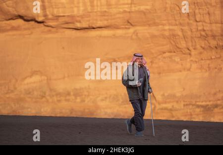 Al Ula, Saudi Arabia, 2nd. January 2022: Saudi man walking in the nature of in Al Ula, Saudi Arabia Stock Photo