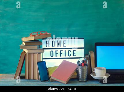 home office,business,concept with laptop computer row of books and sign,, free copy space, mock up Stock Photo
