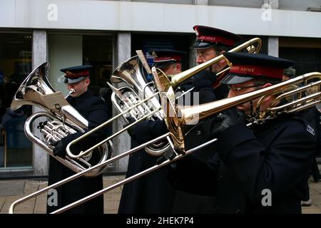 A tuba player and a trombonist in the Salvation Army brass band on Croydon's North End shopping street. Stock Photo