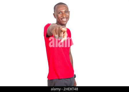 portrait of an adult businessman pointing his finger at you and smiling at the camera. Stock Photo