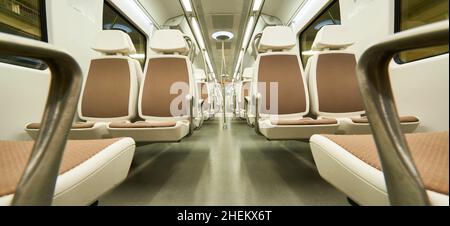 Empty seats in a modern train car Stock Photo