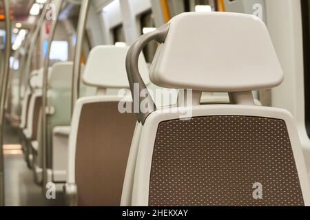 Empty seats in a modern train car Stock Photo