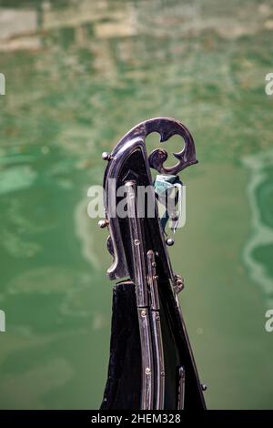 detail of iron bow element at a gondola as symbol for Venice Stock Photo