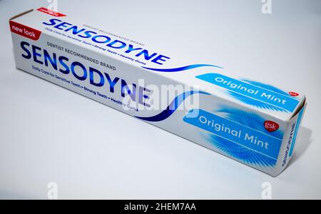 Norwich, Norfolk, UK – January 2022. Gsk Sensodyne toothpaste isolated on a plain white background Stock Photo