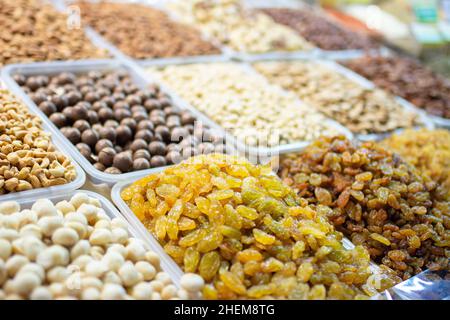 Dried Fruits, Nuts and Candied Fruits on the Market. tasty and healthy food photo. Stock Photo