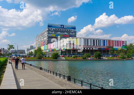 The colorful building of the Ostankino television center on the bank of the city pond. Moscow, Russia May 28, 2016. Stock Photo