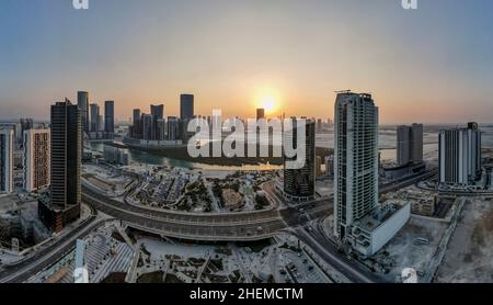 Aerial view on Al Reem island in Abu Dhabi at sunset Stock Photo