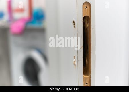 interior door with the lock removed. replacement and repair of the lock. Stock Photo