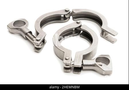 Two clamps for attaching pipe parts to each other on a white background Stock Photo