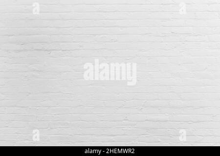 white painted vintage old brick wall gives a harmonic background Stock Photo