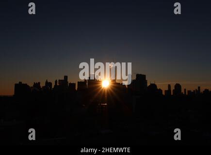 New York, United States. 11th Jan, 2022. Steam and smoke like exhaust rises from the rooftops of Manhattan Skyscrapers including One World Trade Center in freezing cold temperatures in New York City on Tuesday, January 11, 2022. Photo by John Angelillo/UPI Credit: UPI/Alamy Live News Stock Photo