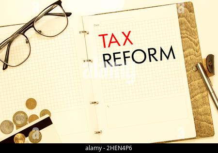 Conceptual hand writing text caption inspiration showing Tax Reform. Business concept for Government Change in Taxes written on sticky note paper on t Stock Photo