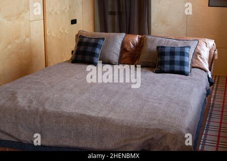 King-size bed in a modern bedroom Stock Photo