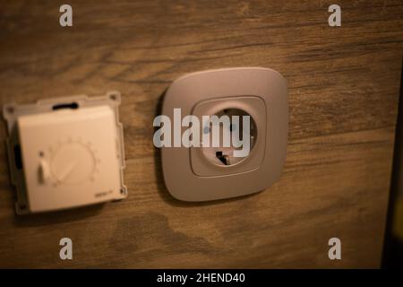 Socket for electrical appliances in a modern apartment inside the house Stock Photo