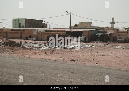 Djibouti, Djibouti - May 21, 2021: A dump and Djiboutian people in Djibouti. Editorial shot in Djibouti. Stock Photo