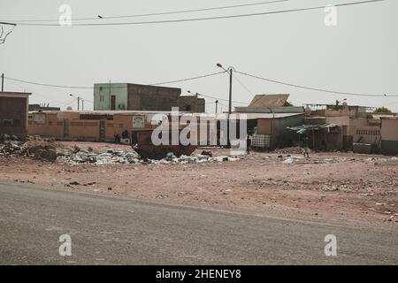 Djibouti, Djibouti - May 21, 2021: A dump and Djiboutian people in Djibouti. Editorial shot in Djibouti. Stock Photo