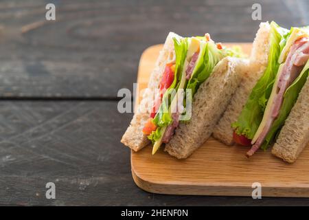 sandwich on wood background Stock Photo