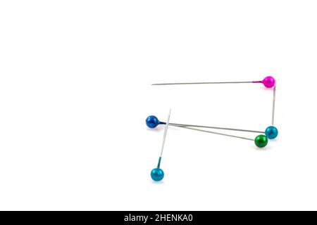 Color sewing push pins isolated on white background Stock Photo