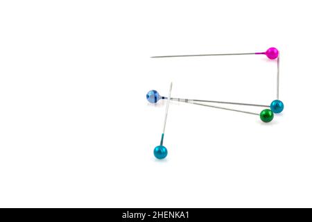 Color sewing push pins isolated on white background Stock Photo