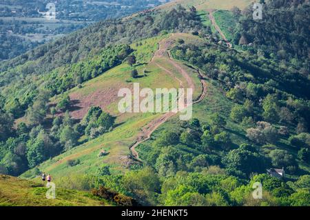 Malvern Worcestershire,England-June 01 2021:Visitors to this popular beauty spot,enjoy exercising and taking in the beautiful views from the various h Stock Photo