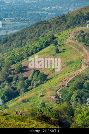 Malvern Worcestershire,England-June 01 2021:Visitors to this popular beauty spot,enjoy exercising and taking in the beautiful views from the various h Stock Photo