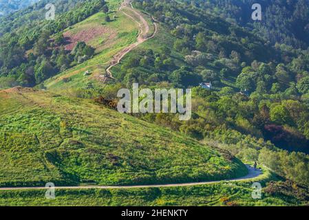 Malvern Worcestershire,England-June 01 2021:Visitors to this popular beauty spot,enjoy exercising and taking in the beautiful views from the various h Stock Photo