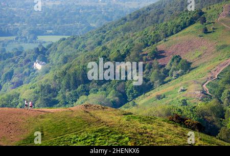 Malvern Worcestershire,England-June 01 2021:Visitors to this popular beauty spot,enjoy exercising and taking in the beautiful views from the various h Stock Photo