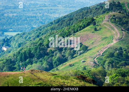 Malvern Worcestershire,England-June 01 2021:Visitors to this popular beauty spot,enjoy exercising and taking in the beautiful views from the various h Stock Photo