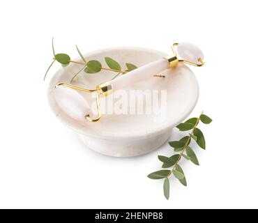 Face massage roller on white background Stock Photo