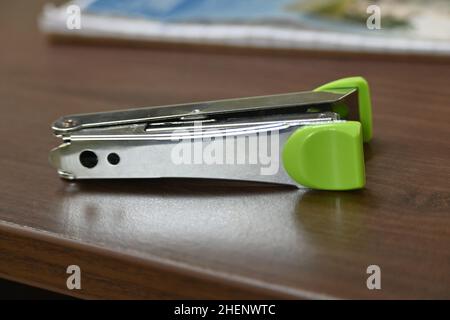 Stapler on the table denoting education Stock Photo