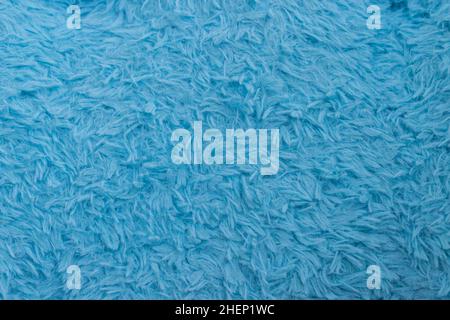 Beautiful sparkling artificial blue fur texture background Stock Photo