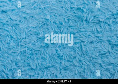 Beautiful sparkling artificial blue fur texture background Stock Photo
