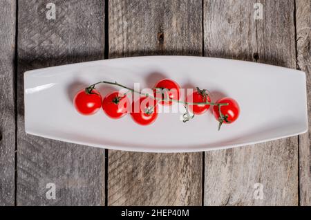 Beautiful table setting with lavender flowers on wooden background. Stock Photo