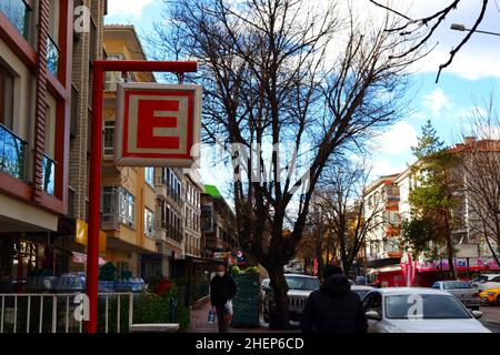 Red letter E of pharmacy signboard at street, pharmacy in Turkish-Eczane- Stock Photo