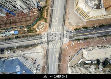 Anyang, Anyang, China. 12th Jan, 2022. On January 11, 2022, in the locked area of Hua county, Anyang City, Henan Province, the ''empty city'' photographed by UAV aerial photography, people stayed at home, cars were not on the road, and the operation was suspended. On January 8th, a case of asymptomatic infection of Covid-19 appeared in Huaxian, Anyang, Henan province. It immediately upgraded the epidemic control measures and strengthened the management of the village (Village). The county is divided into sealed control area, control area and prevention area according to the epidemic preventi Stock Photo