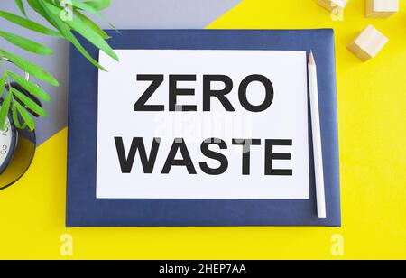 Handwriting text zero waste on yellow background, Business concept, Top view flat lay Stock Photo