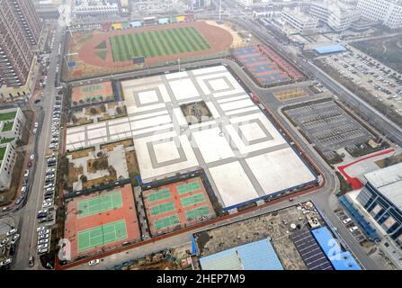 Anyang, Anyang, China. 12th Jan, 2022. On January 11, 2022, in the locked area of Hua county, Anyang City, Henan Province, the ''empty city'' photographed by UAV aerial photography, people stayed at home, cars were not on the road, and the operation was suspended. On January 8th, a case of asymptomatic infection of Covid-19 appeared in Huaxian, Anyang, Henan province. It immediately upgraded the epidemic control measures and strengthened the management of the village (Village). The county is divided into sealed control area, control area and prevention area according to the epidemic preventi Stock Photo