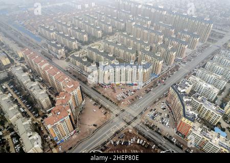 Anyang, Anyang, China. 12th Jan, 2022. On January 11, 2022, in the locked area of Hua county, Anyang City, Henan Province, the ''empty city'' photographed by UAV aerial photography, people stayed at home, cars were not on the road, and the operation was suspended. On January 8th, a case of asymptomatic infection of Covid-19 appeared in Huaxian, Anyang, Henan province. It immediately upgraded the epidemic control measures and strengthened the management of the village (Village). The county is divided into sealed control area, control area and prevention area according to the epidemic preventi Stock Photo